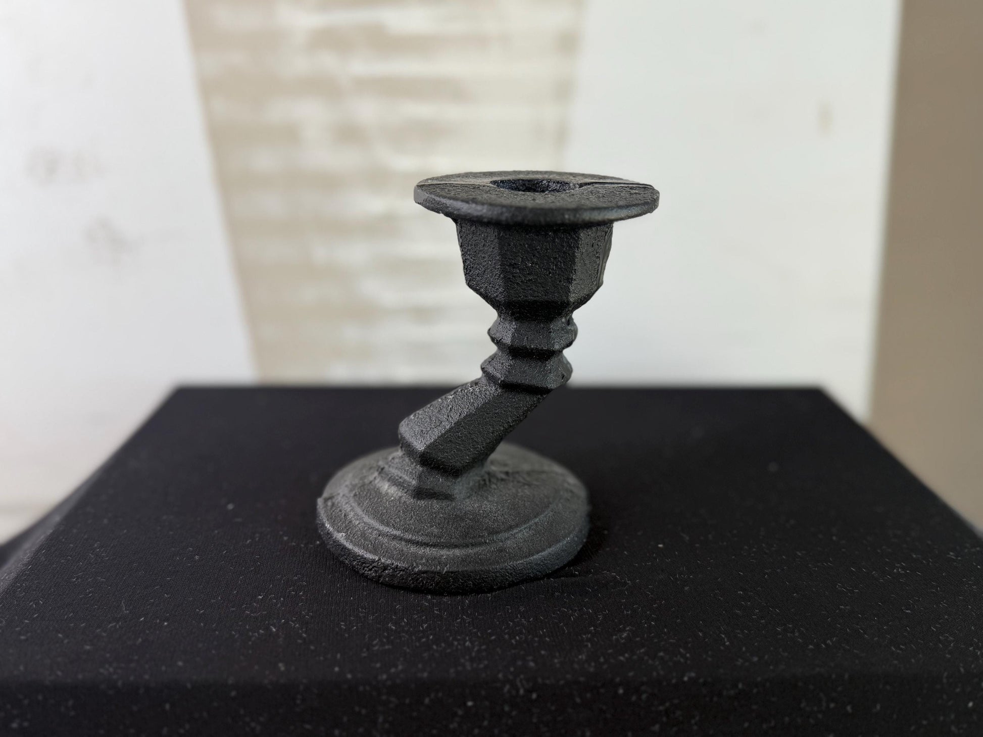 Cast iron candle holder