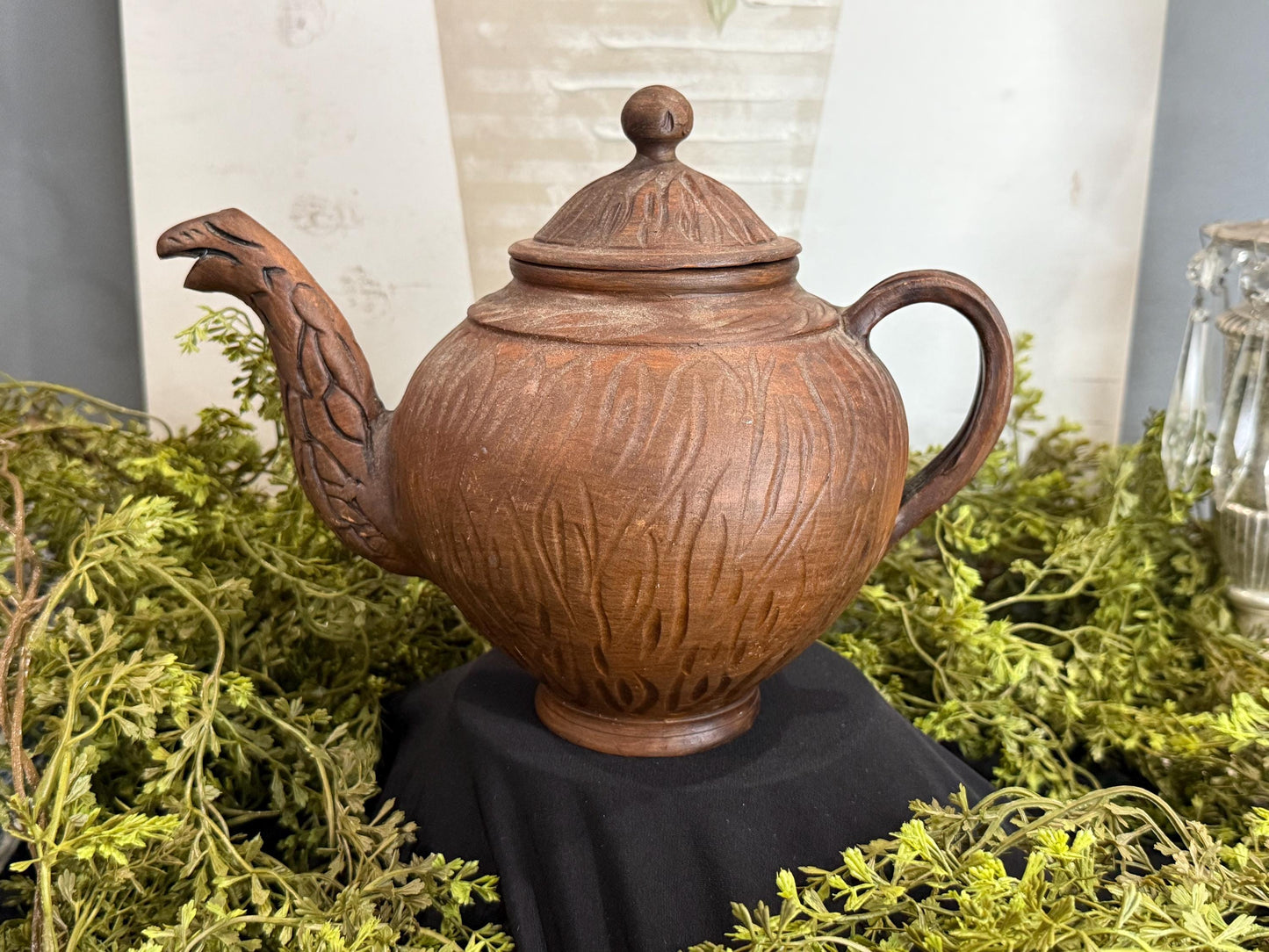 Handmade clay teapot with snake spout