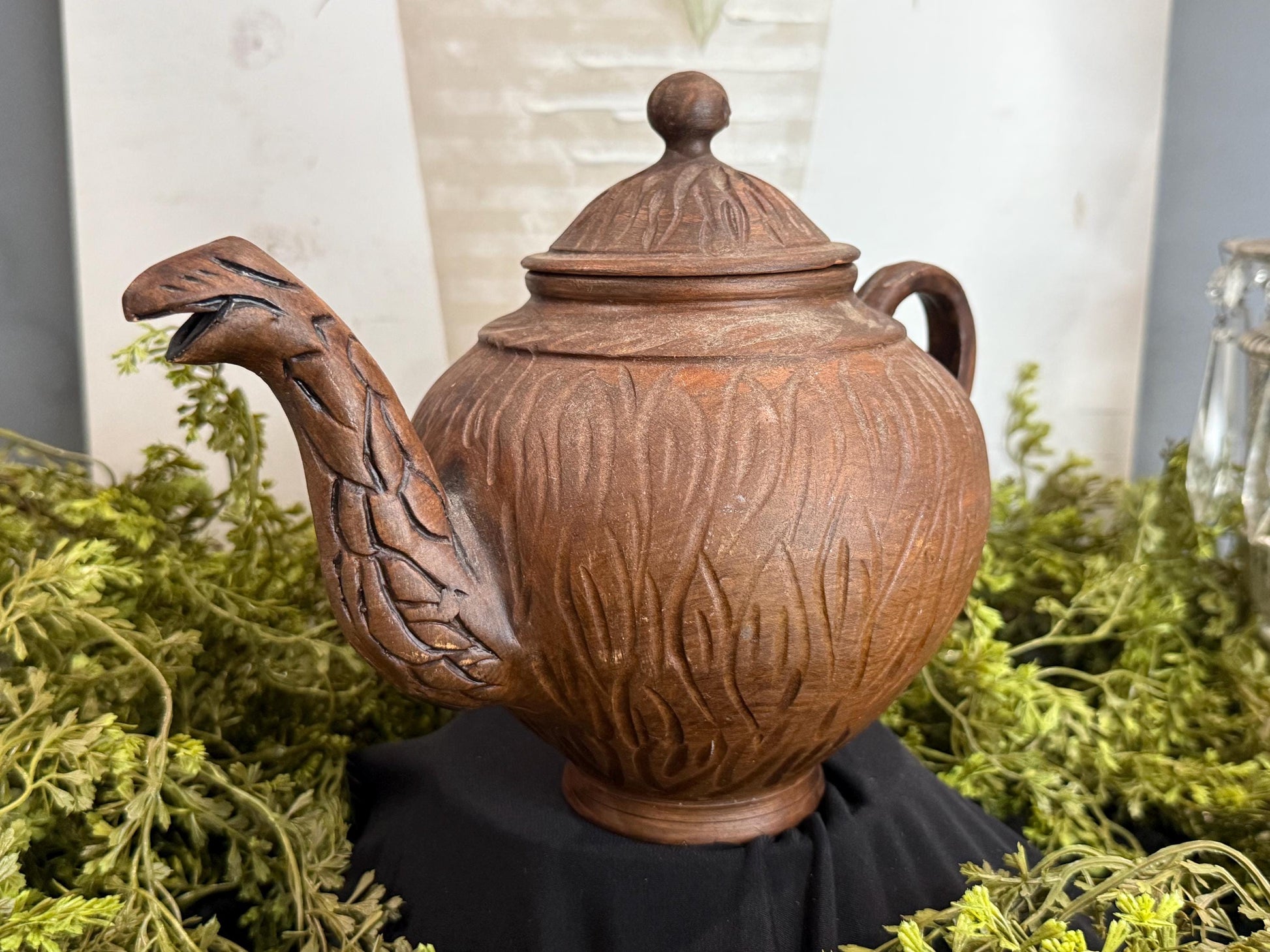 Handmade clay teapot with snake spout