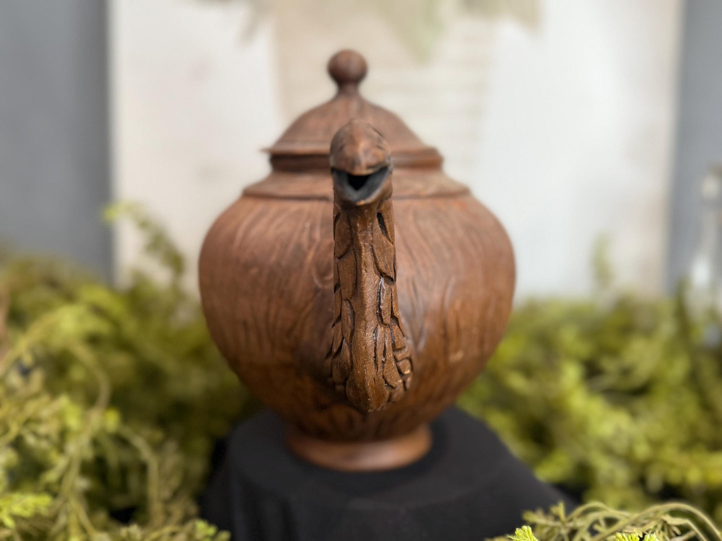Handmade clay teapot with snake spout
