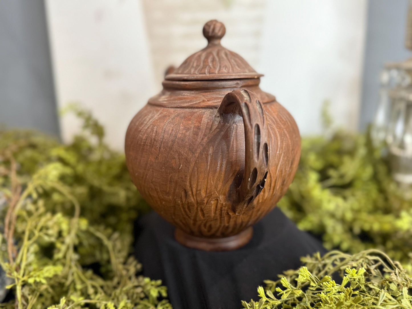 Handmade clay teapot with snake spout