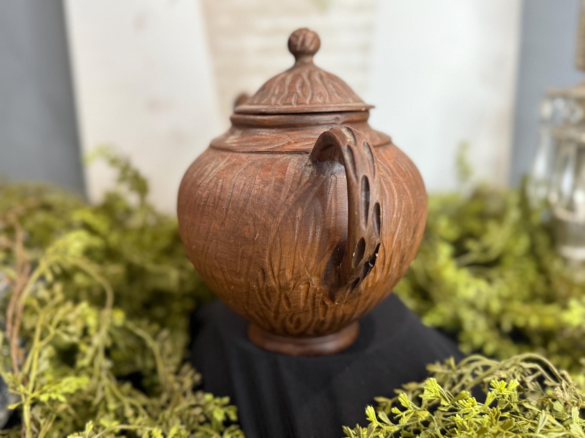 Handmade clay teapot with snake spout