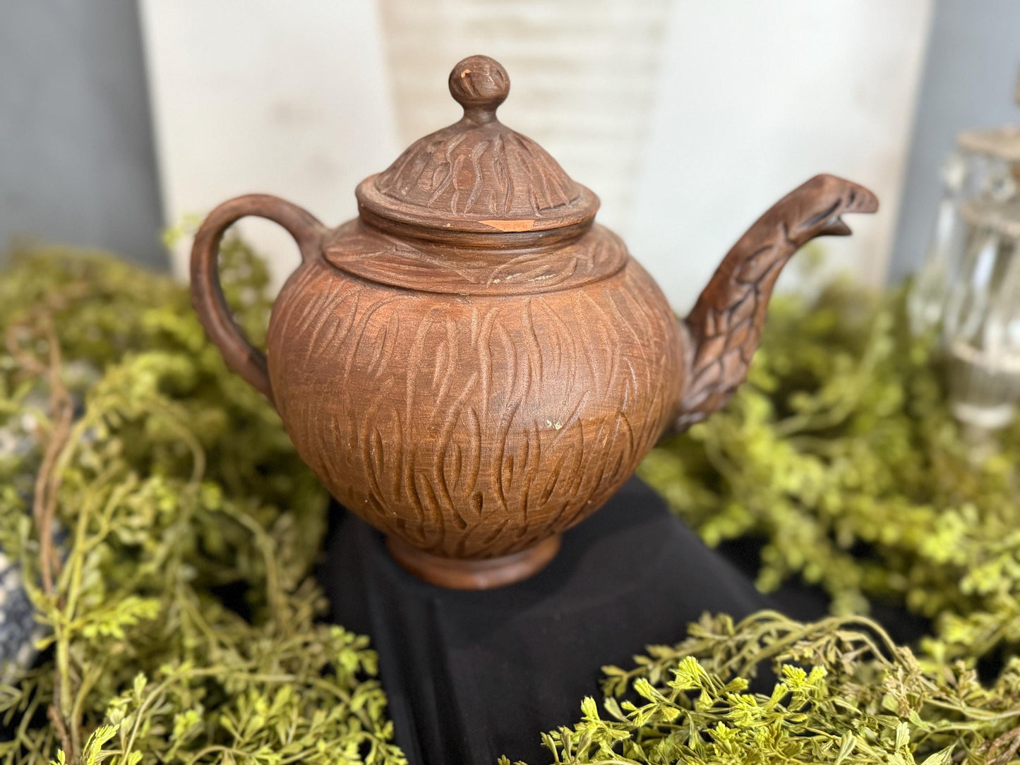 Handmade clay teapot with snake spout