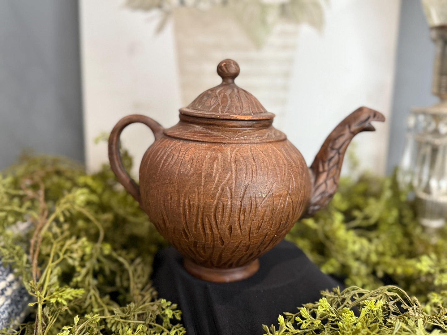 Handmade clay teapot with snake spout