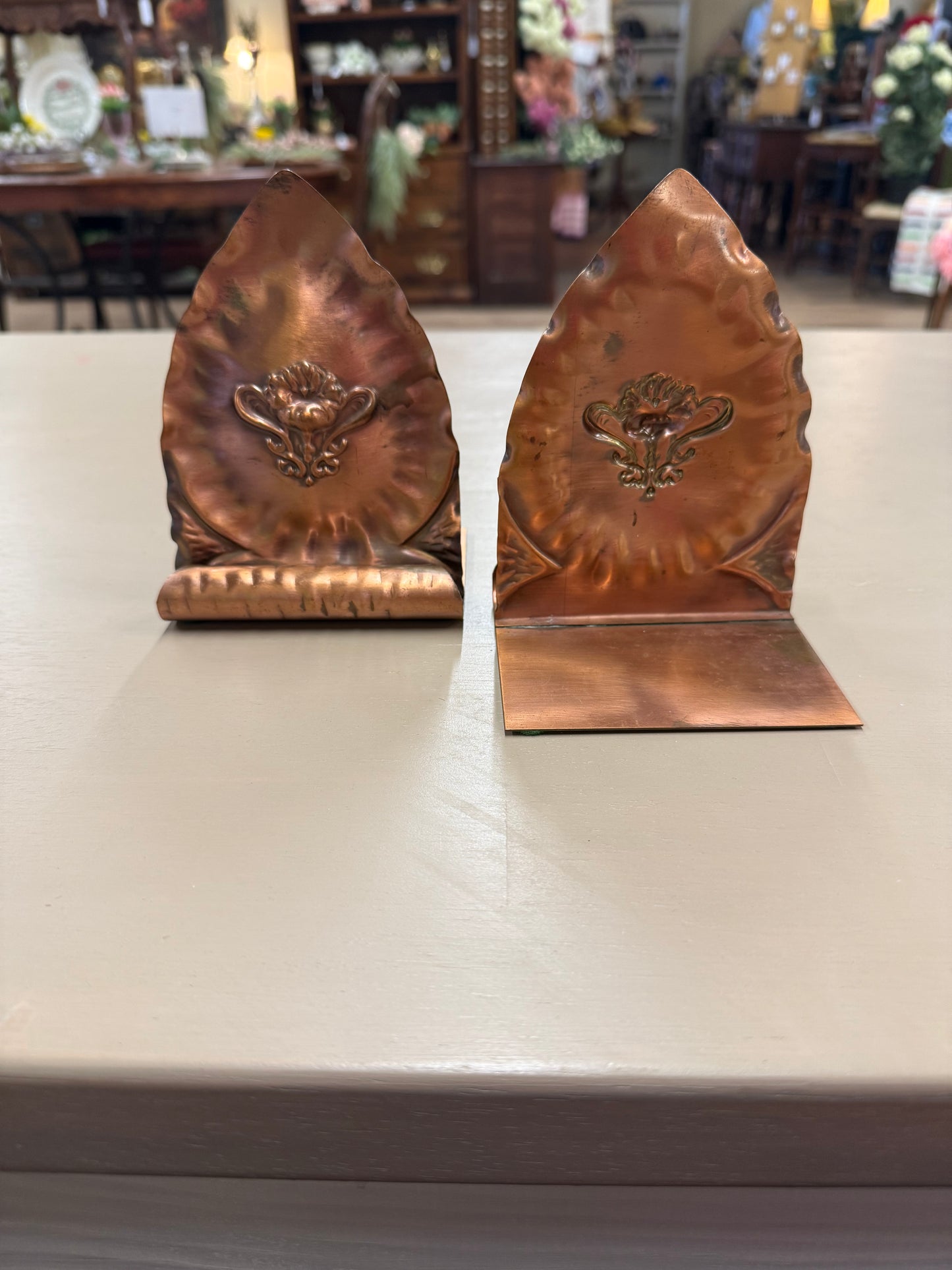 Gregorian solid copper bookends with floral motif