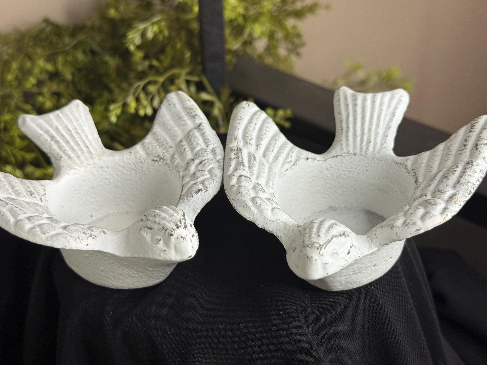 Pair of cast iron bird tea light candle holders