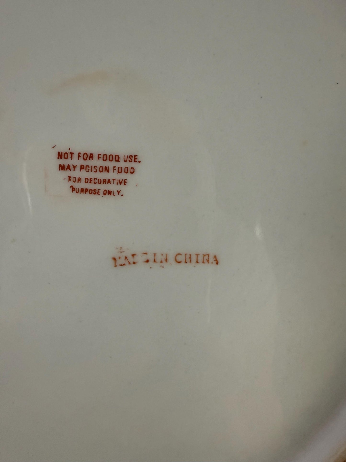 Porcelain embellished rose plate